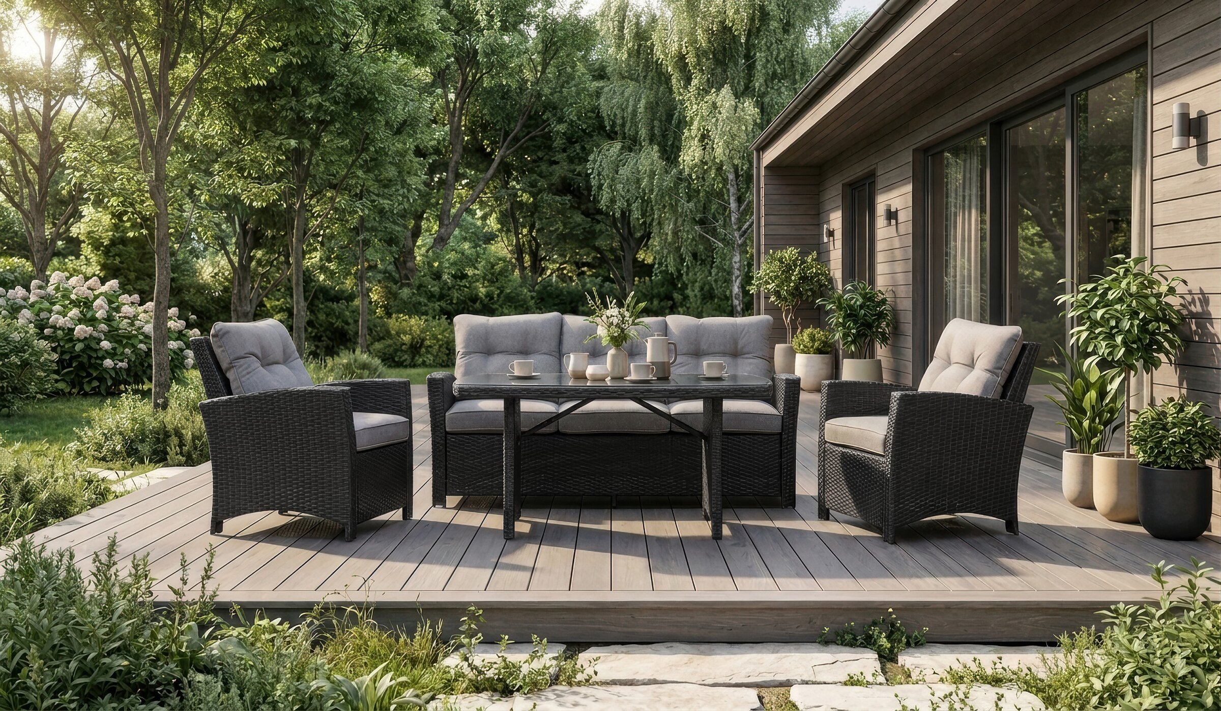 3D visualisation of a black outdoor furniture set on a modern wooden deck