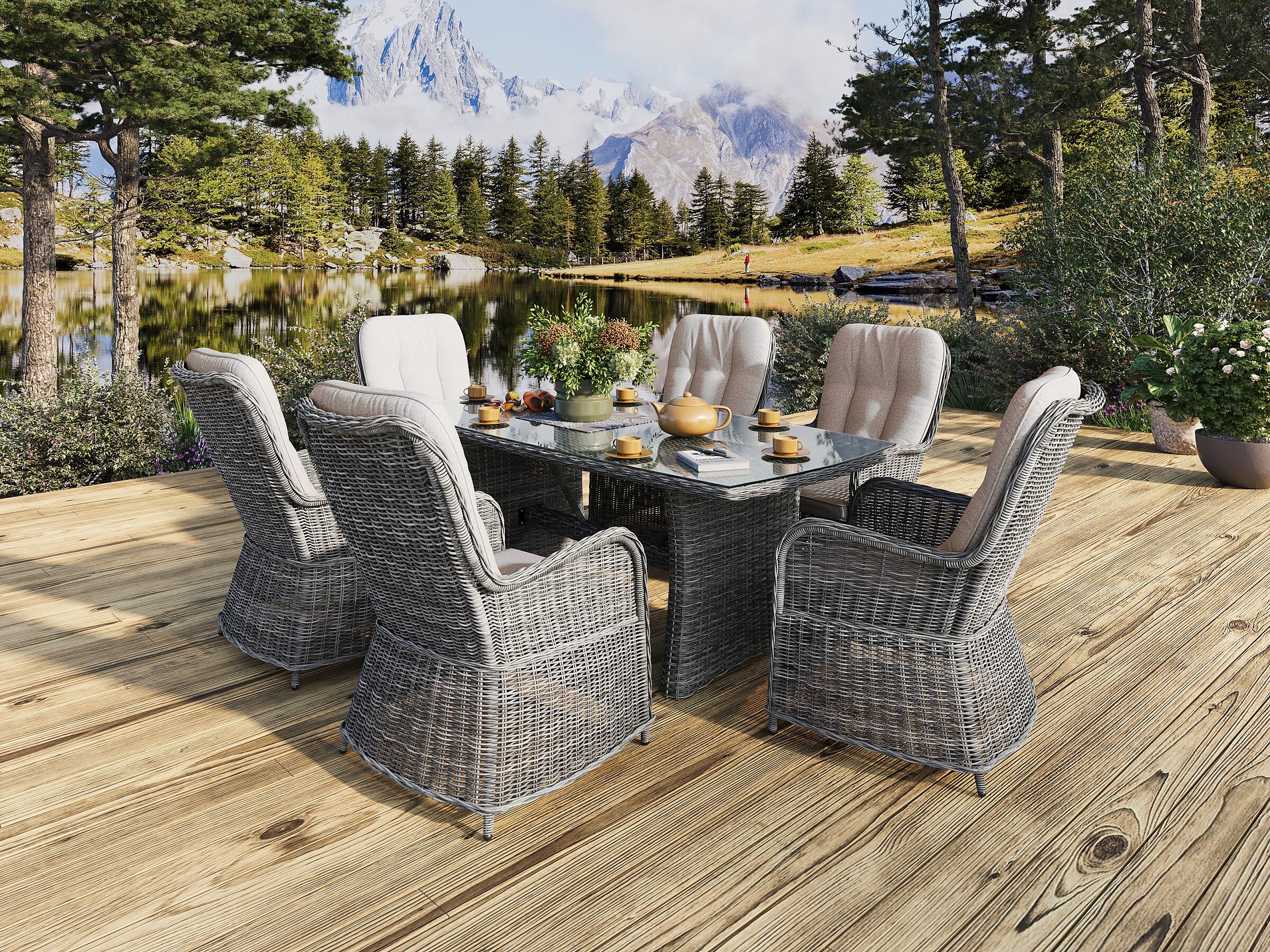 Product visualisation of the Holiday Garden outdoor dining set featuring grey wicker armchairs and a table on a wooden terrace with a lake and mountain view