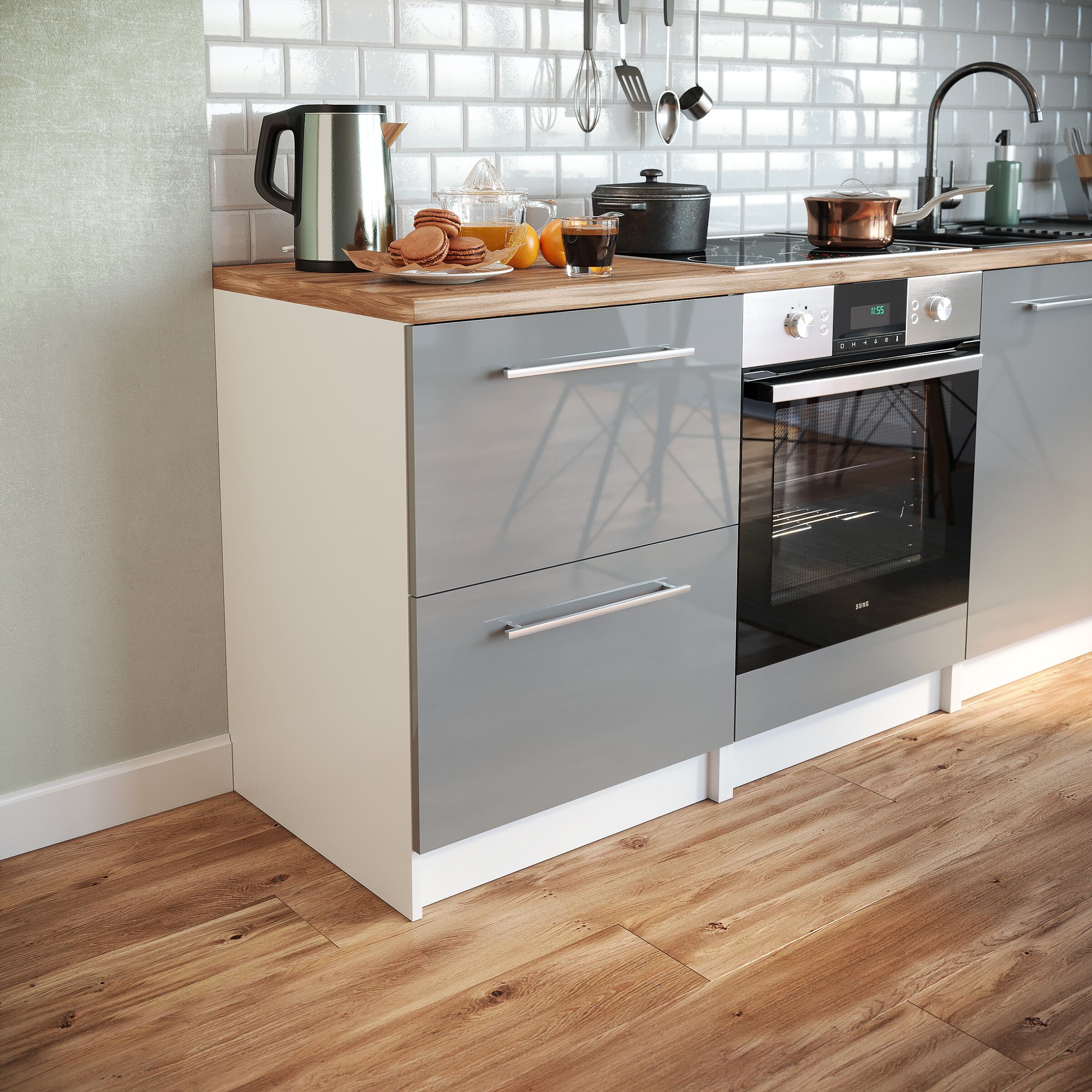 Close-up of a grey kitchen cabinet with gloss fronts and a wooden worktop