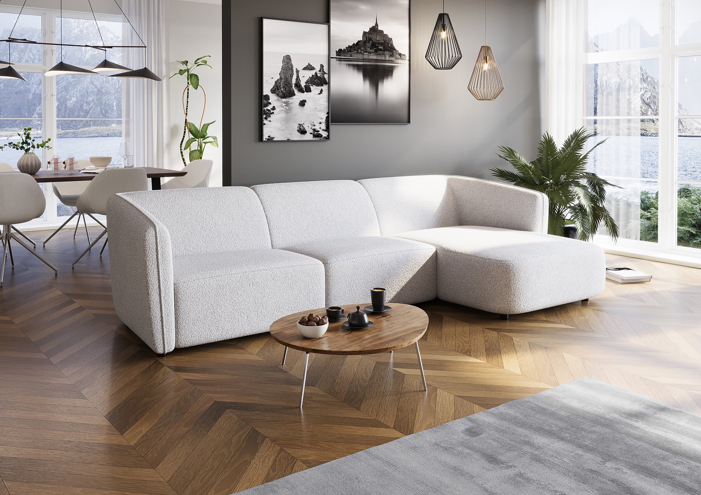 Product visualisation of the white Bornholm corner sofa in a modern Scandinavian-style living room with herringbone wood flooring and black-and-white wall art