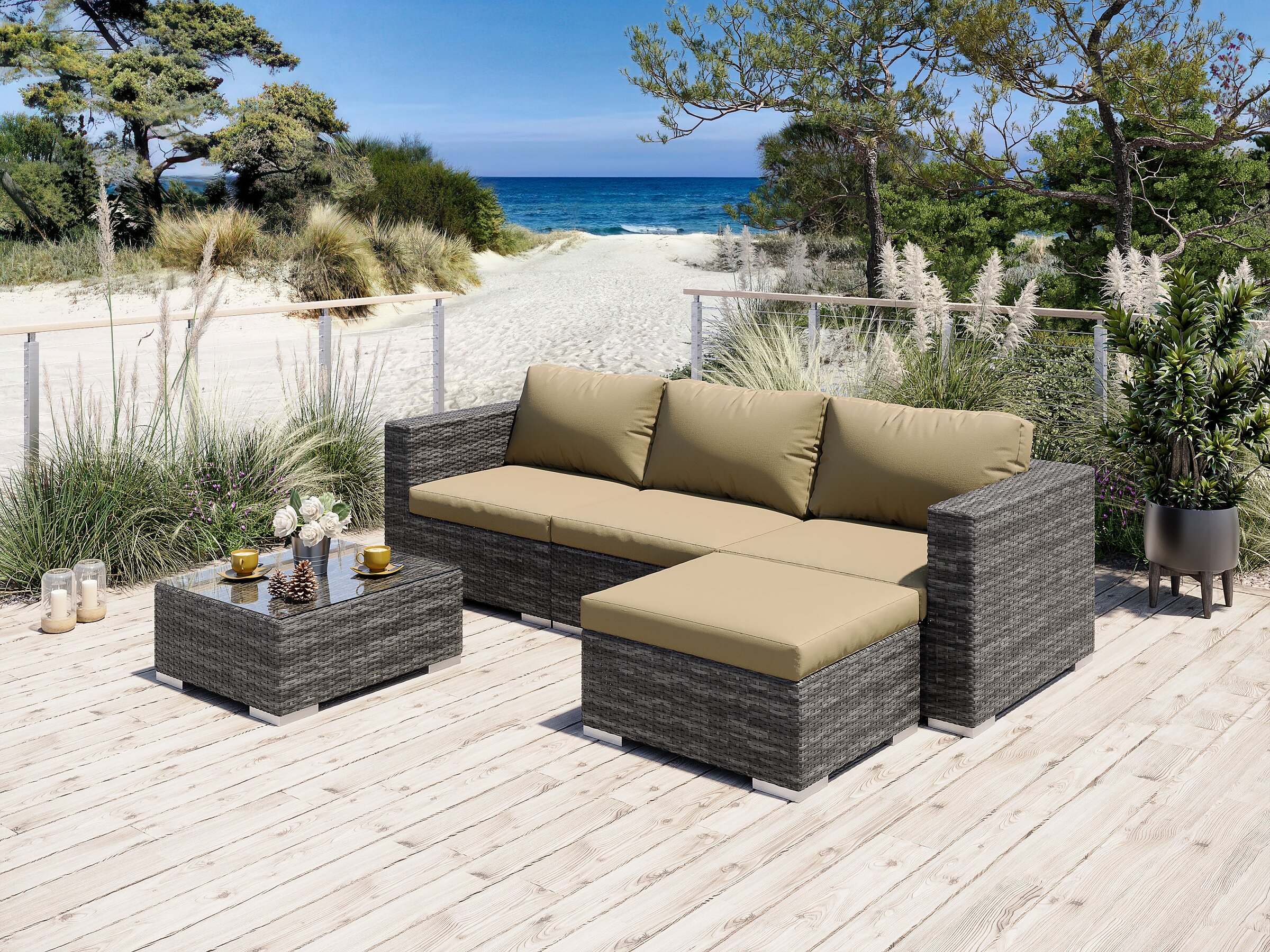 Product visualisation of the Moonlight grey wicker outdoor lounge furniture set with beige cushions and a coffee table on a terrace with a beach and sea view