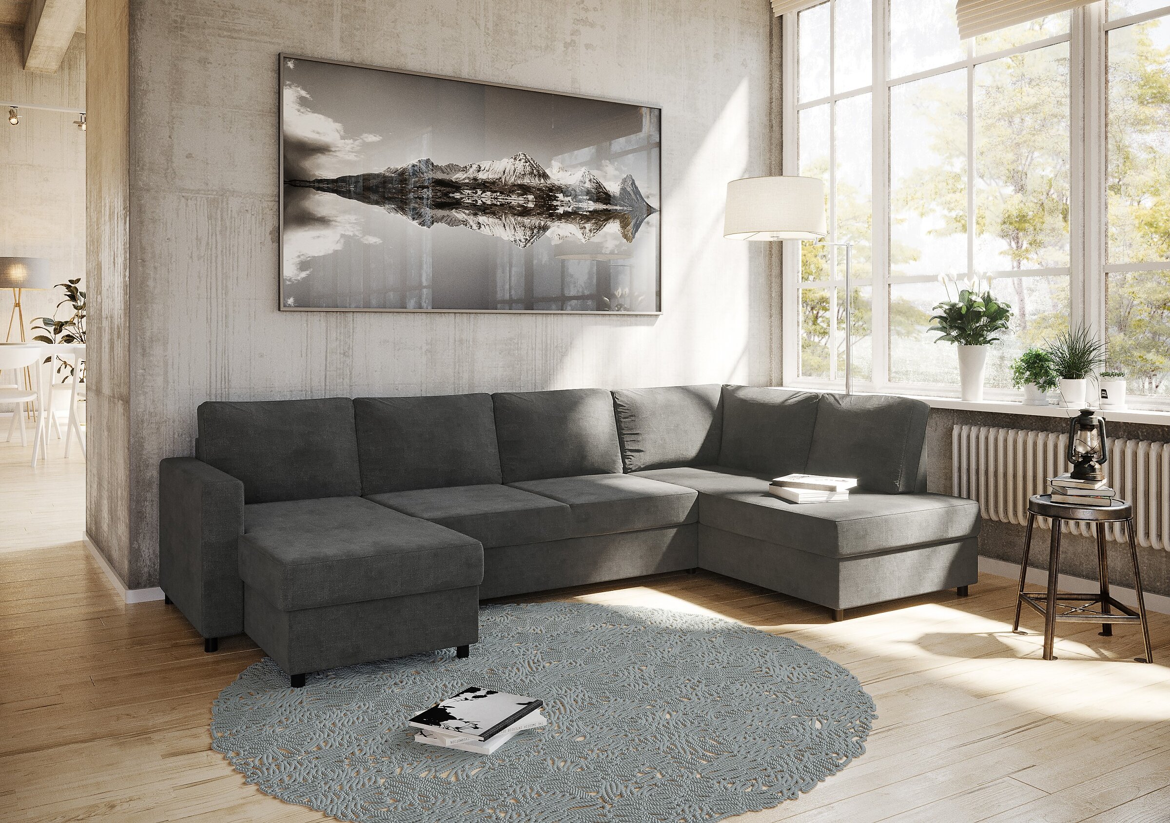 Product visualisation of the dark grey Svelvik D3A large corner sofa in a modern Scandinavian-style living room with a concrete wall and a round grey rug