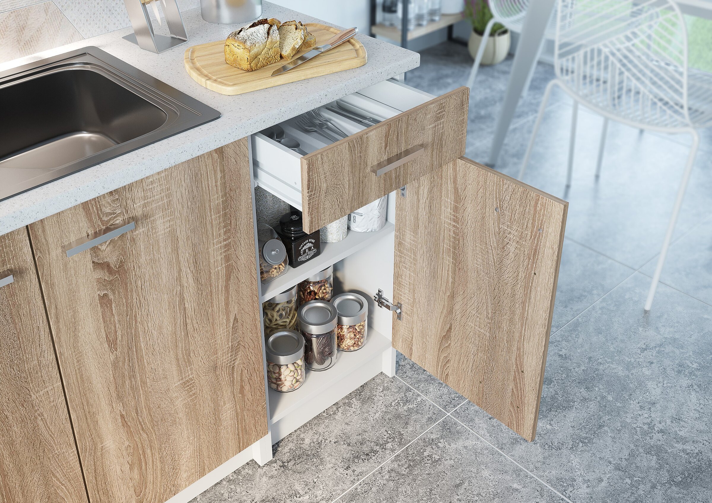 Close-up of a wood-grain kitchen cabinet with an open cutlery drawer