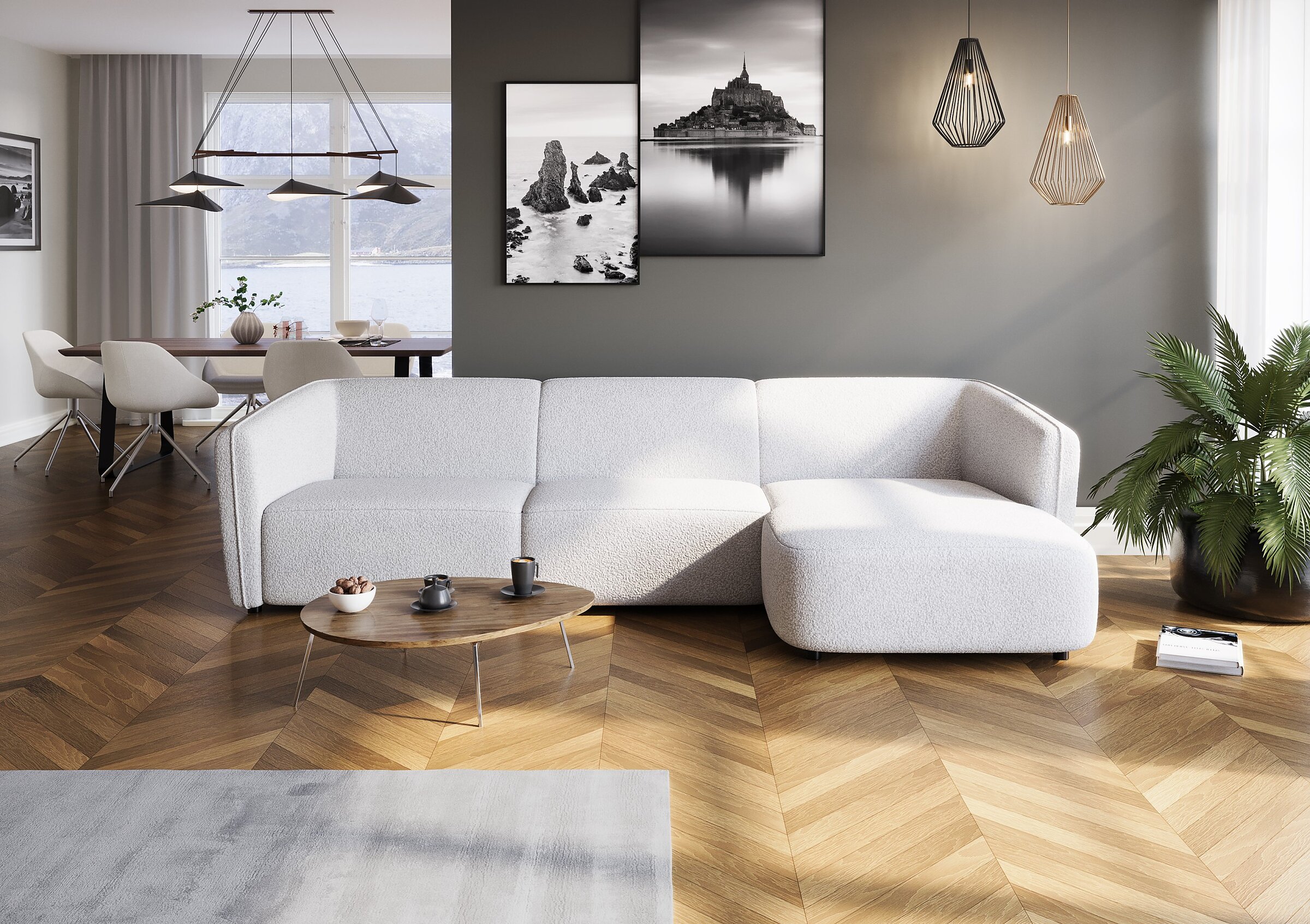 Wizualizacja produktowa białej sofy narożnej Bornholm w nowoczesnym salonie w stylu skandynawskim z drewnianą podłogą w jodełkę i czarno-białymi grafikami na ścianie