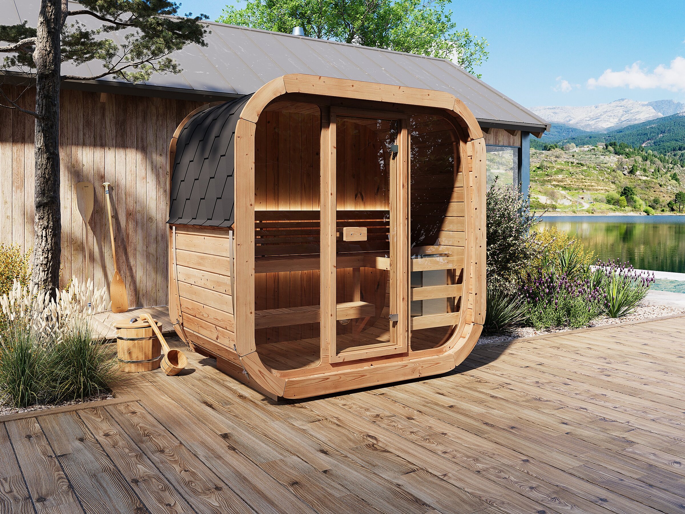 Product visualisation of the Stryn 125 outdoor wooden sauna with a glass front on a terrace with a water and mountain view