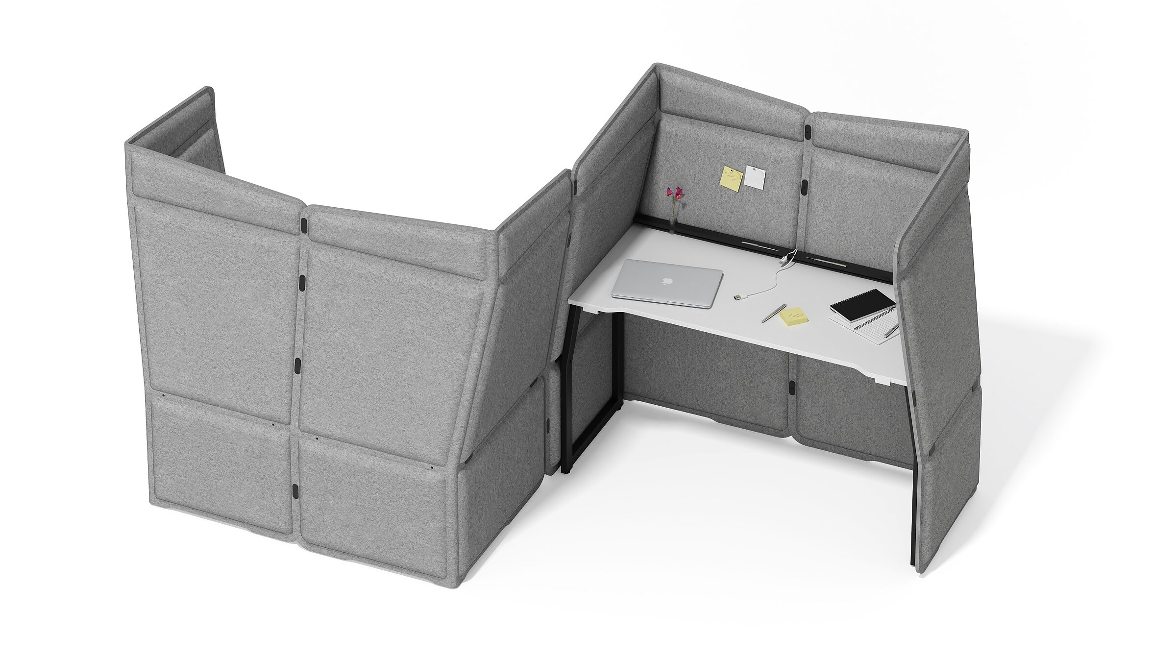 Modular set of acoustic desks featuring grey felt panels and white desktops